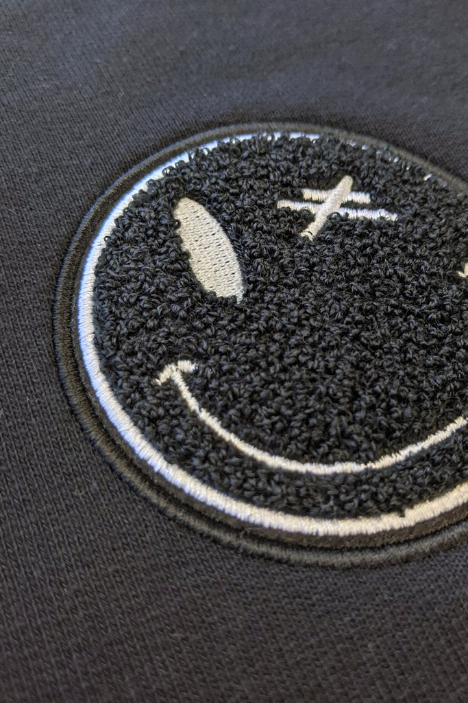 Motif Wink Sweatshirt